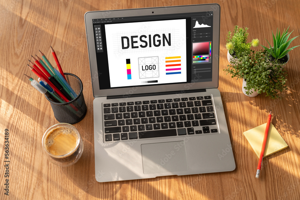 Fototapete Graphic designer software for modern design of web page and commercial ads showing on the computer screen