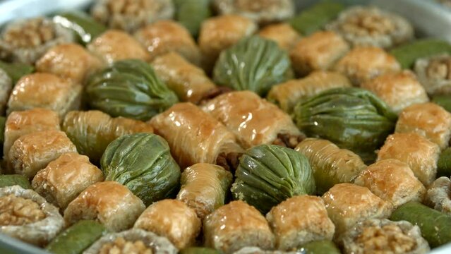 Traditional turkish baklava pistachio pastry. Dilberdudagi, ozel kesim baklava, cikolatali baklava, fistikli baklava, katmer, fistikli kadayif, kattafi, fistik sarma, soguk baklava, midye baklava, cev