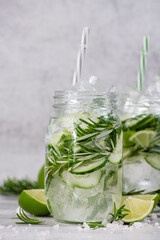Fresh Sassi water with cucumber, lime and rosemary in jar