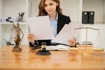Fototapeta na wymiar Business woman Lawyers having Concepts of Legal services at the law office work Legal advice online