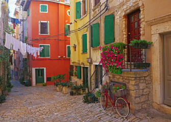 Plakat Streets of Rovinj with calm, colorful building facades, Istria, Croatia