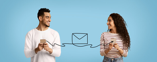 Smiling Arab Man And Woman Holding Smartphones Connected With Envelope Shape String