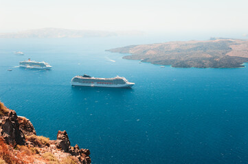 Santorini island, Greece. Cruise ships near the coast.