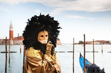 Beautiful colorful masks at traditional Venice Carnival in Venice, Italy