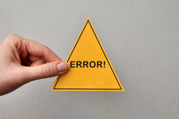 The image of the yellow triangle and the inscription: "error" on it