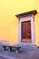 ancient door in Piazza dei Vicari in the town of Scarperia in Florence,Tuscany, Italy