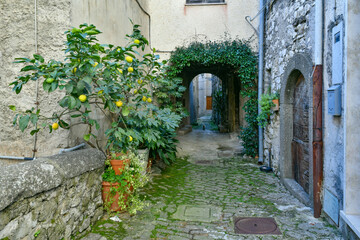 Obraz na płótnie Canvas A narrow street in the historic center of Patrica, an old village in Lazio in the province of Frosinone, Italy.