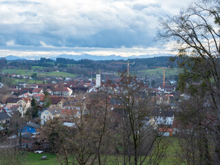 Andechs, Germany - December 27th 2022: View from the monastery hill towards the village and the Alps