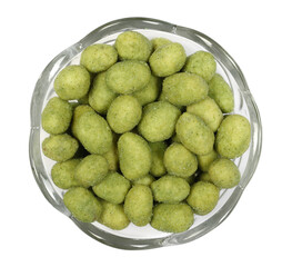Wasabi coated peanuts in glass bowl isolated on white, top view