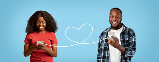 Dating Online. Romantic Black Couple Using Smartphones Connected With Heart Shape String