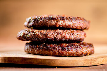 Burger grill on a cutting board. 