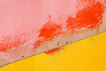 Random painted background, orange yellow and pink colors.