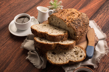 Freshly baked wheat bread loaf breakfast table