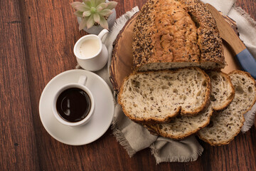 Freshly baked wheat bread loaf breakfast table