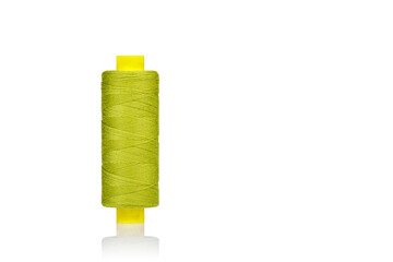 skein of thread green colors macro on a white background