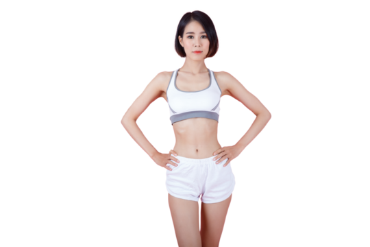 Confident sportswoman in white sportsbra, holding hands on waist, fitness trainer standing in power pose, workout in gym, pink background.