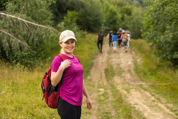 Naklejka premium Fit woman walking on the mountain. Healthy lifestyle concept