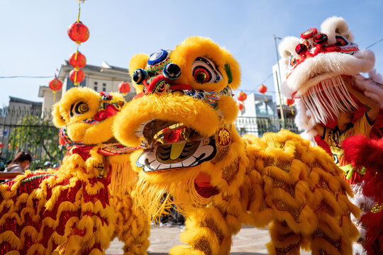 Dragon and lion dance show in chinese new year festival (Tet festival ), lion Dance - dragon and lion dance street performances in Vietnam. Selective focus.
