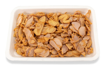 Sliced chicken meat kebab in plastic food tray for sale in supermarket, isolated on white with clipping path included