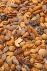 A group of almonds, pistachios, walnuts, macadamia, cashews.