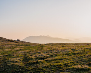 Peaceful sunset over the mountains, golden light, no people, background, Great sugarloaf in Wicklow, Ireland