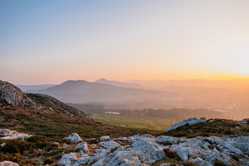 View from Bray head with sugarloaf mountain in the backdrop at sunset, aerial view, nature and...