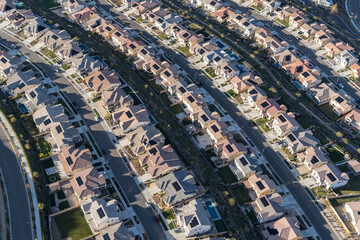 Aerial view of modern solar roof homes near Los Angeles in suburban Santa Clarita California.