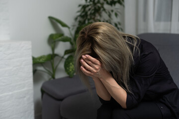 Closeup portrait of a young woman praying