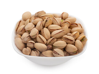 White bowl of pistachios nuts isolated on a white background