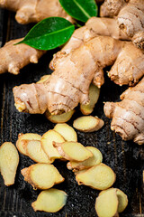 Pieces of fragrant ginger with leaves. 