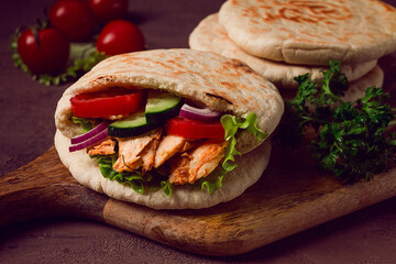 Shawarma in pita bread, chicken, with vegetables, homemade, no people,