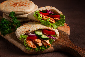 Shawarma in pita bread, chicken, with vegetables, homemade, no people,
