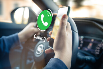 Teenager receiving a phone call during driving a car. Security, technology, communication concept.