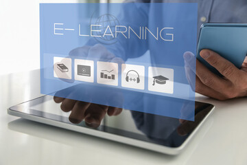 E-learning, education, study online concept. Closeup of man hands using tablet and smartphone.