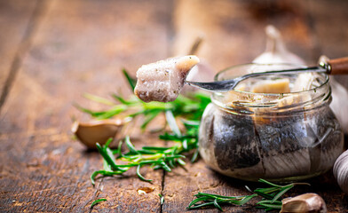 Pieces of pickle herring fillet. 
