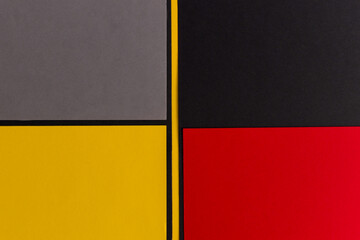 Yellow, gray, black and red divided background