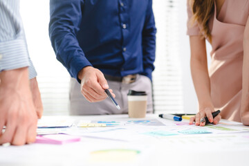 group of businesspeople sitting together in a meeting for best ideas, International executive team people having board discussing project results. Diverse employees group working with senior worker