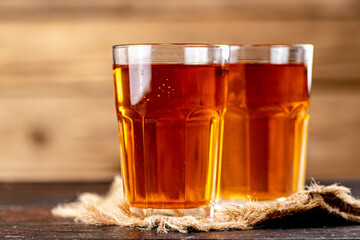 Freshly squeezed apple juice in a glass. 