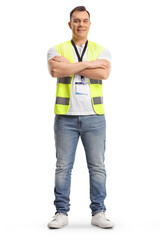 Full length portrait of a security guard in a safety vest standing with crossed arms