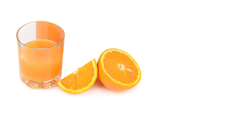 Orange juice in glass isolated on white . Free space for text. Wide photo.