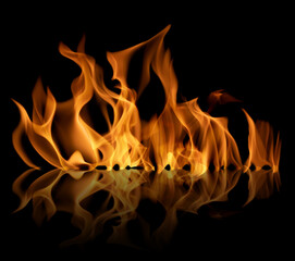 fire orange bright sparks reflections on black