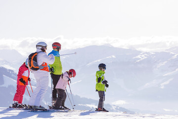 man and woman skiing and snowboarding in the mountains, ski reso