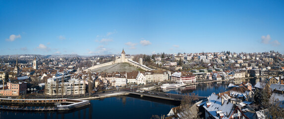 Panorama aerial view of the Swiss old town Schaffhausen in winter, with the medieval castle Munot over the Rhine river. Munot is the landmark of this town.