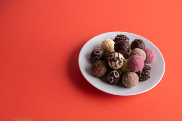 photo of a variety of chocolate rounds on a plate