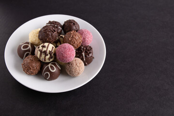 photo of a lot of chocolates in a plate
