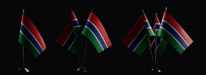 Small national flags of the Gambia on a black background
