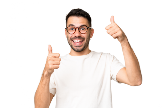 Young handsome caucasian man over isolated chroma key background giving a thumbs up gesture