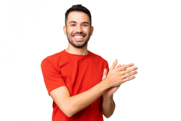 Young handsome caucasian man over isolated chroma key background applauding