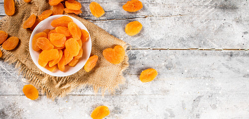 Fragrant dried apricots in a bowl on the table. 