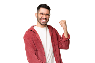 Young handsome caucasian man over isolated chroma key background celebrating a victory